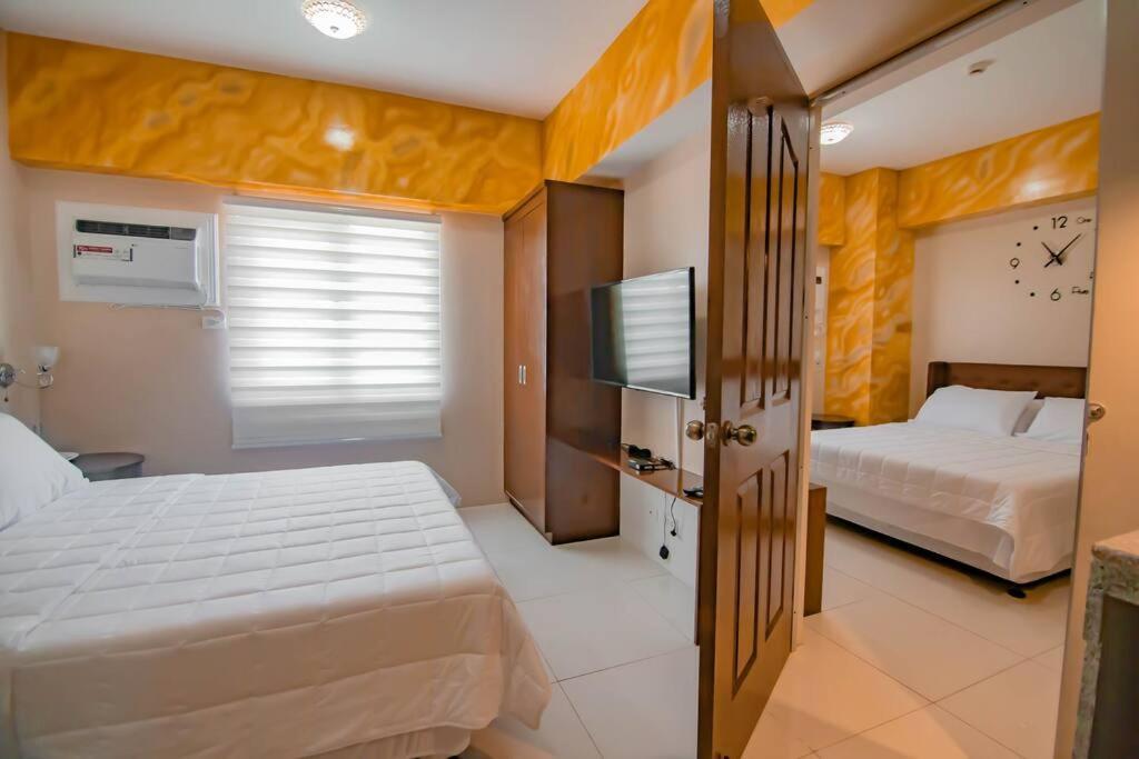 Appartamento 1822 Deluxe Twin - Migas Haven At Sunvida Tower Cebu Esterno foto